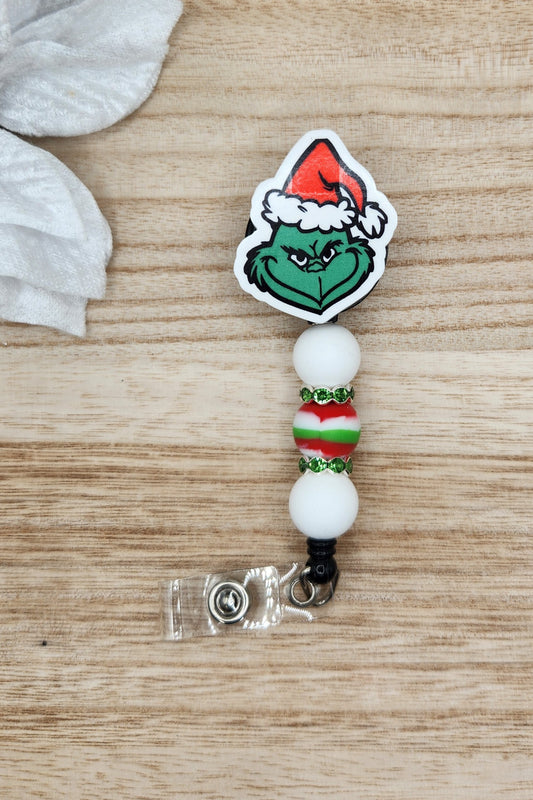 Badge Reel-OG Mean Green Guy (Christmas Swirl)