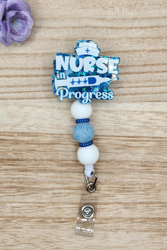 Badge Reel-Nurse in Progress (Blue Glitter)