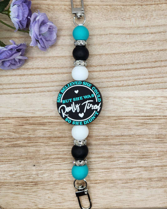 Kindle/Tablet Strap-She Believed She Could But She Was Really Tired So She Didn't (Turquoise)