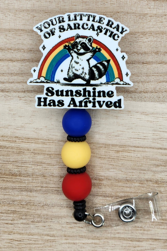 Badge Reel-Your Little Ray of Sarcastic Sunshine Has Arrived Raccoon SS021